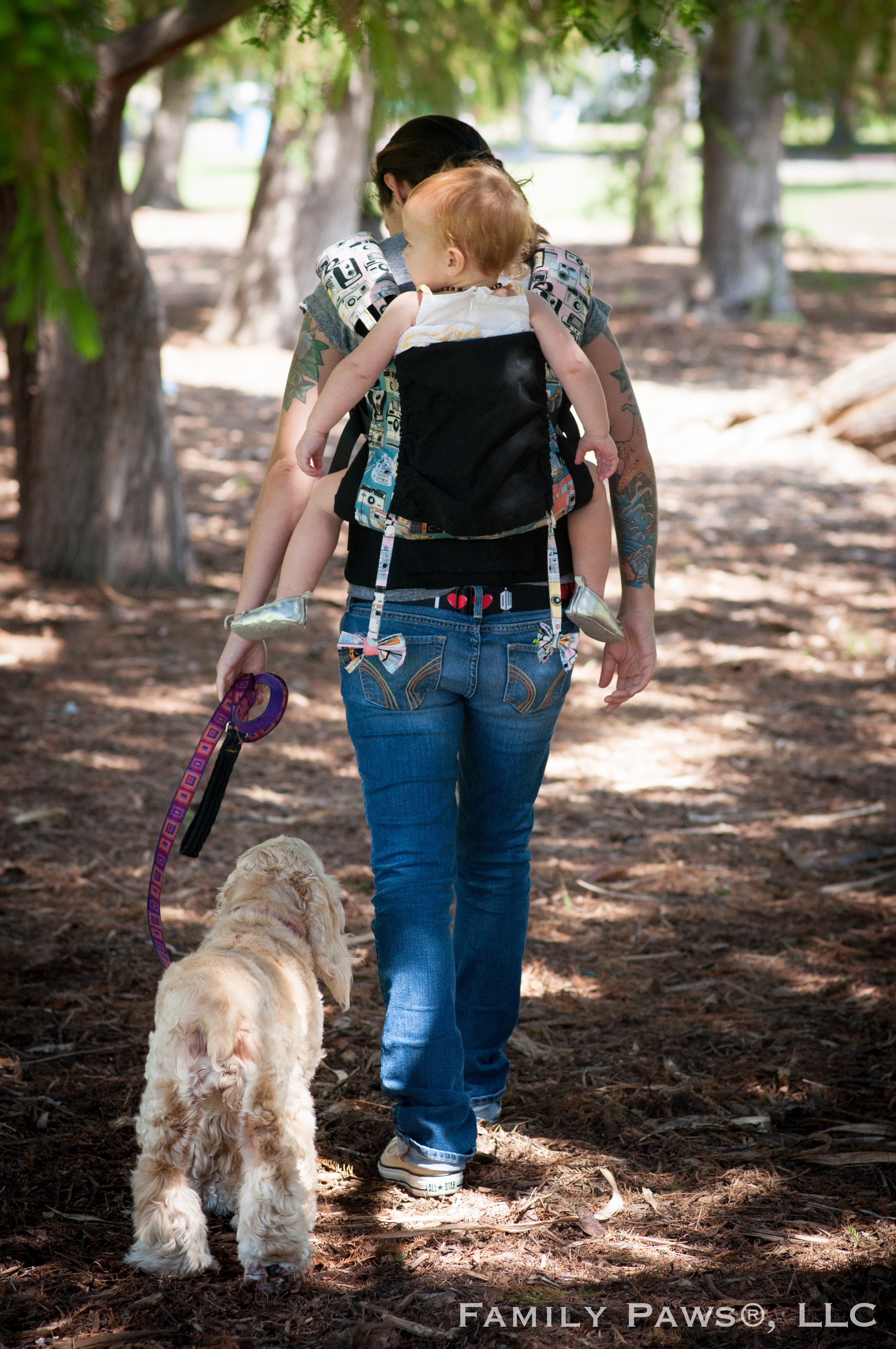 Parent with newborn and dog